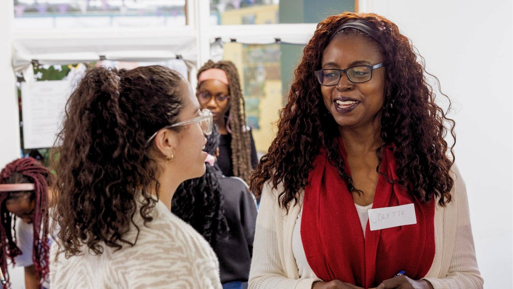 Two community members in conversation at a TIA gathering